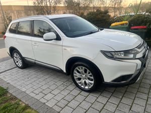 Mitsubishi Outlander 2019, white family car seven seater,.