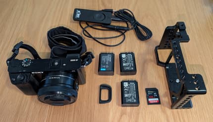 Sony a6000 + 16–50mm OSS, SmallRig Cage, 3 Batteries 128GB SD + Remote ...
